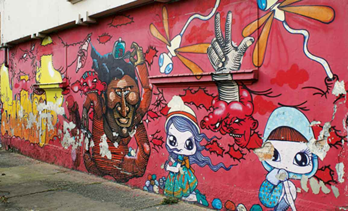 Collective graffiti made by OsGemeos, Nunca and Nina Pandolfo
