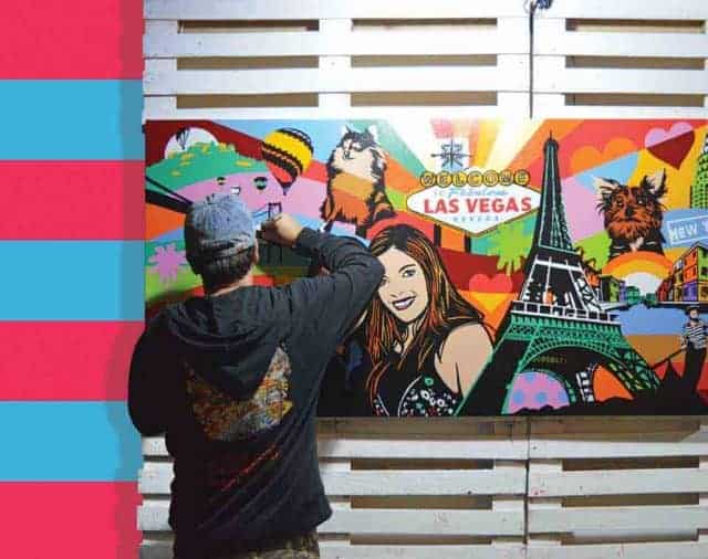 Lobo pintando uma obra em seu ateliê de arte