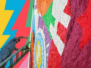 Artista Lobo faz pintura de mural inspirado em Los Angeles